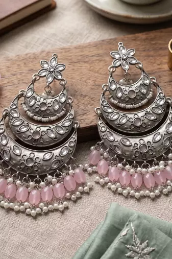 Oxidized silver-toned layered chandbali earrings with blush pink drops