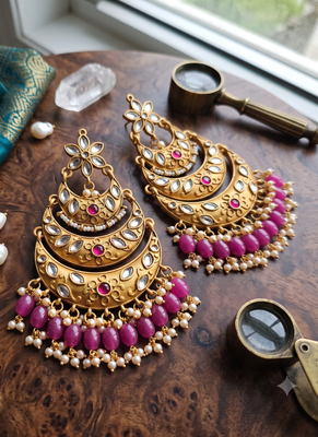 Traditional gold-toned layered chandbali earrings with pink kundan drops 2
