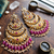 Traditional gold-toned layered chandbali earrings with pink kundan drops