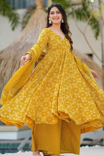 Women's mustard yellow printed muslin anarkali kurta set with palazzo and dupatta