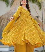 Women's mustard yellow printed pure muslin anarkali kurta set with palazzo and dupatta