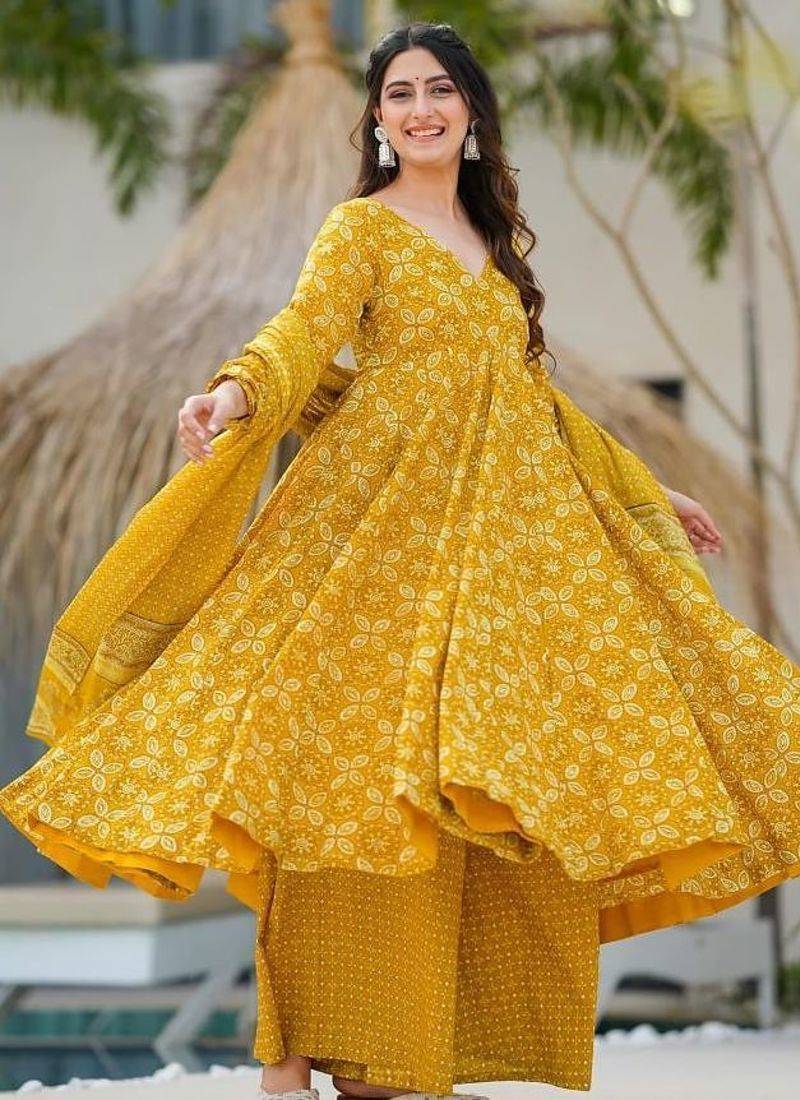 Women's mustard yellow printed pure muslin anarkali kurta set with palazzo and dupatta
