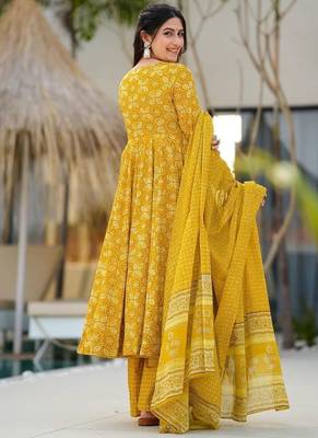 Women's mustard yellow printed pure muslin anarkali kurta set with palazzo and dupatta 2