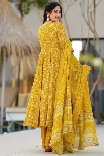 Women's mustard yellow printed pure muslin anarkali kurta set with palazzo and dupatta