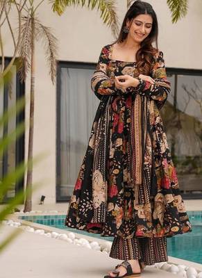 Designer black floral printed mul cotton flared kurta set with palazzo pants and dupatta 2