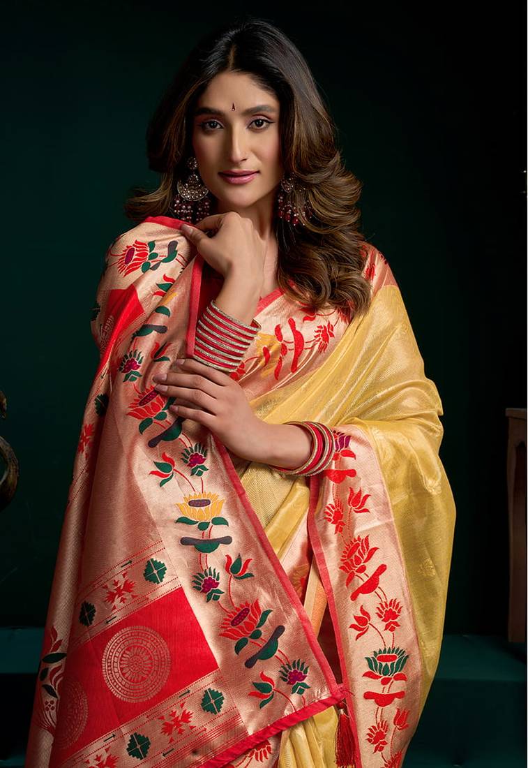 Yellow soft tissue silk blend paithani style saree with blouse piece