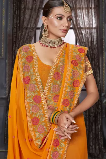 Mustard heavy resham siroski stone work georgette designer saree