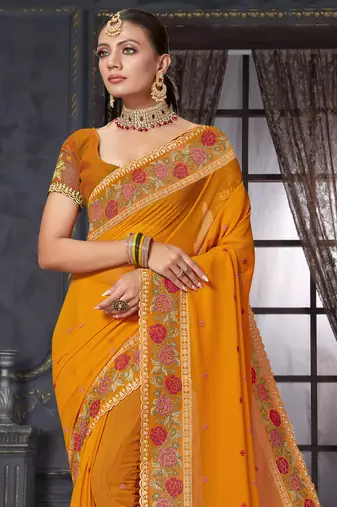 Mustard heavy resham siroski stone work georgette designer saree