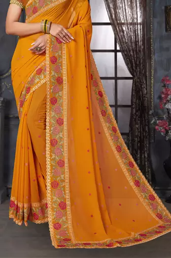 Mustard heavy resham siroski stone work georgette designer saree