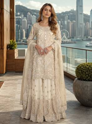 White net free size stitched suit with embroidery & hand work 1
