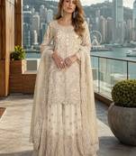 White net free size stitched suit with embroidery & hand work