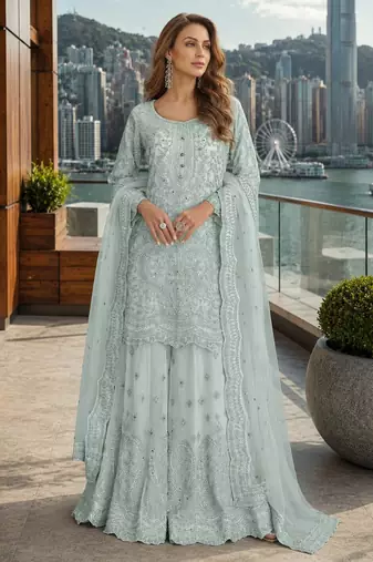 Blue net free size stitched suit with embroidery & hand work