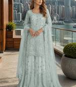 Blue net free size stitched suit with embroidery & hand work