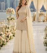 White georgette free size stitched suit with embroidery & zarkan work