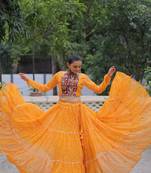 Yellow Navaratri Special Faux Georgette Bandhej Print with Gotta Patti Lace Work Lehenga Choli