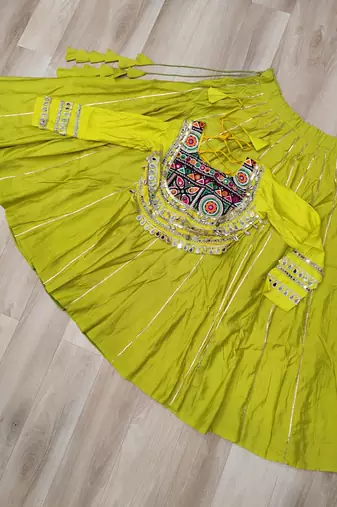 Parrot Green Navaratri Special Gota Patti Work Lehenga with Gamthi Mirror Patch & Cowrie Lace work Choli