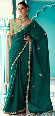 Dark green embroidery work fancy fabric saree with blouse 1
