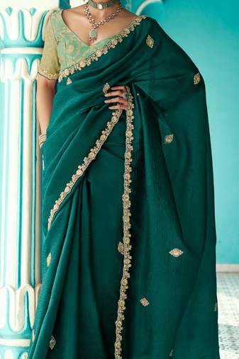 Dark green embroidery work fancy fabric saree with blouse