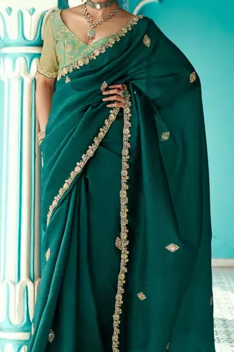 Dark green embroidery work fancy fabric saree with blouse