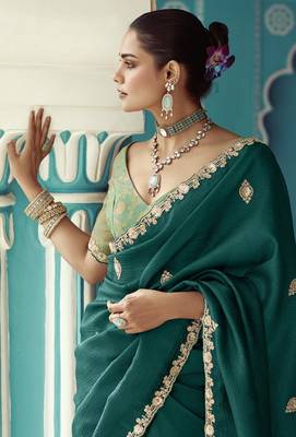Dark green embroidery work fancy fabric saree with blouse 4