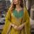 Mustard chinon free size stitched palazzo suit with dhaga & sequin work