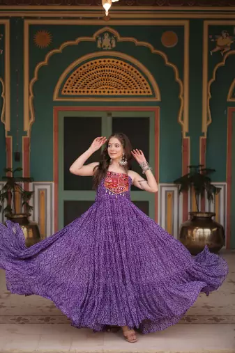 Purple bandhani print faux georgette gown with kutchi patchwork