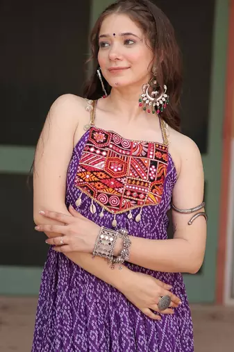 Purple bandhani print faux georgette gown with kutchi patchwork