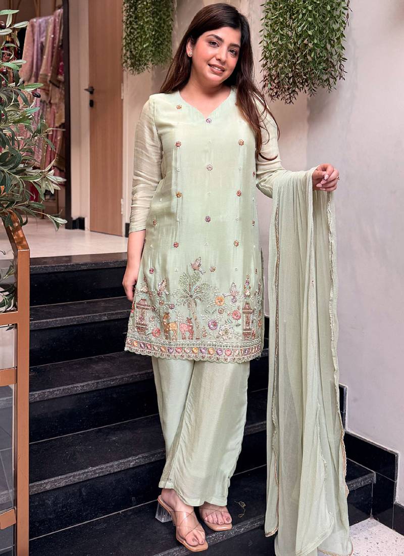 Seg-green embroidered crepe salwar suit