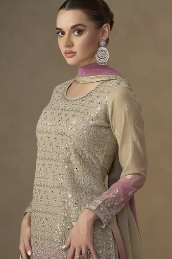Beige and pink embroidered georgete sharara style suit