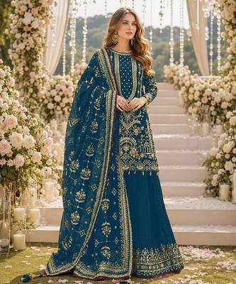 Teal faux georgette suit with embroidery & moti work 1