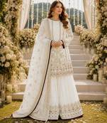 Off white faux georgette suit with embroidery & moti work