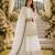 Off white faux georgette suit with embroidery & moti work