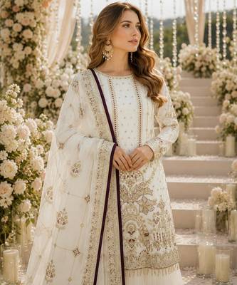 Off white faux georgette suit with embroidery & moti work 2