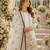 Off white faux georgette suit with embroidery & moti work