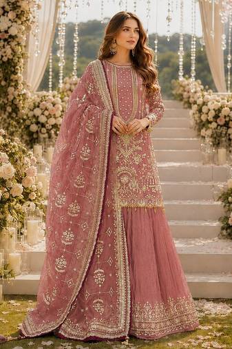 Pink faux georgette suit with embroidery & moti work