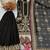 Black faux georgette suit with embroidery & moti work