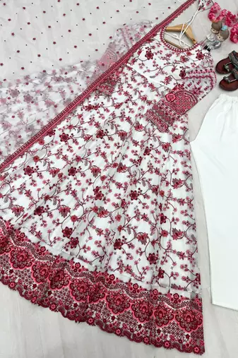 Red & white faux georgette suit with embroidery & tassels attached