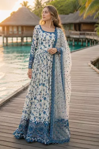 Blue & white faux georgette suit with embroidery & tassels attached