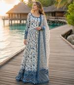 Blue & white faux georgette suit with embroidery & tassels attached