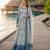 Blue & white faux georgette suit with embroidery & tassels attached