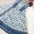 Blue & white faux georgette suit with embroidery & tassels attached