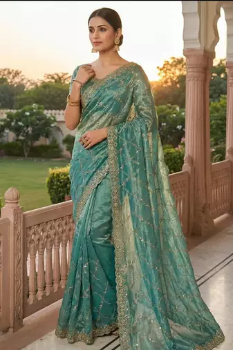 Women silk blend rama green embroidery bollywood saree