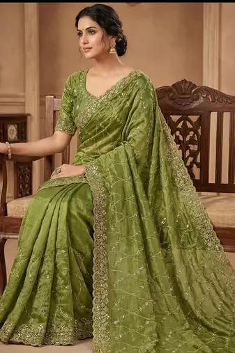 Women silk blend green embroidery bollywood saree