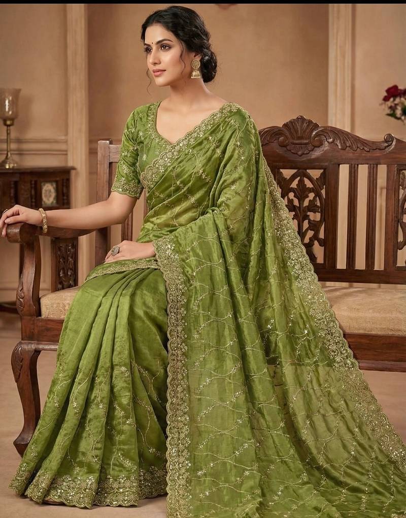 Women silk blend green embroidery bollywood saree