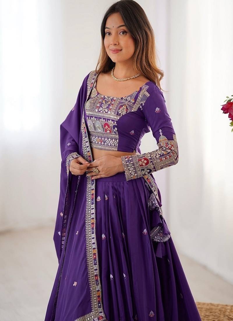Wine Embroidered Silk Lehenga Choli with Heavy Golden Threadwork & Dupatta