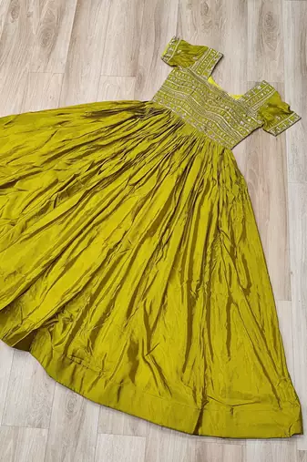 Green silk blend embroidered flared gown set