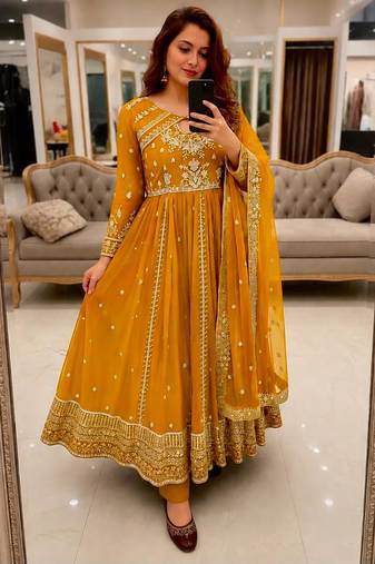 Yellow faux georgette sequins  free size flared gown set