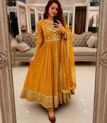 Yellow faux georgette sequins  free size flared gown set
