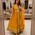 Yellow faux georgette sequins  free size flared gown set