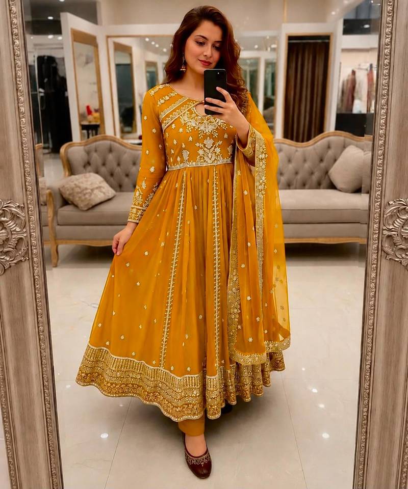 Yellow faux georgette sequins  free size flared gown set
